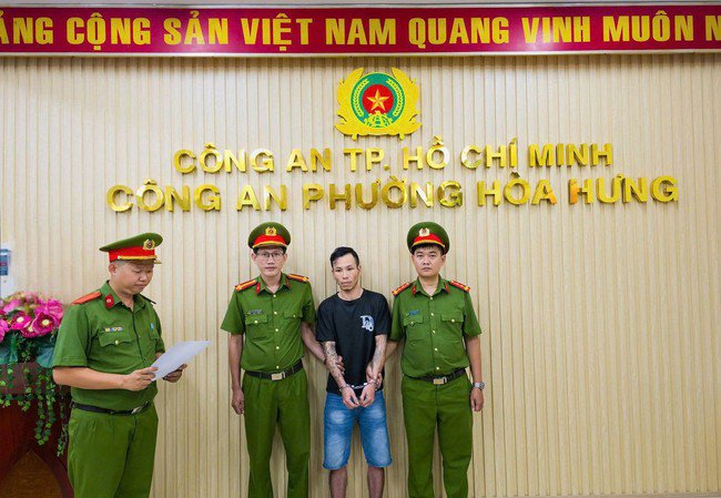 Trần Quốc Đạt tại cơ quan công an.