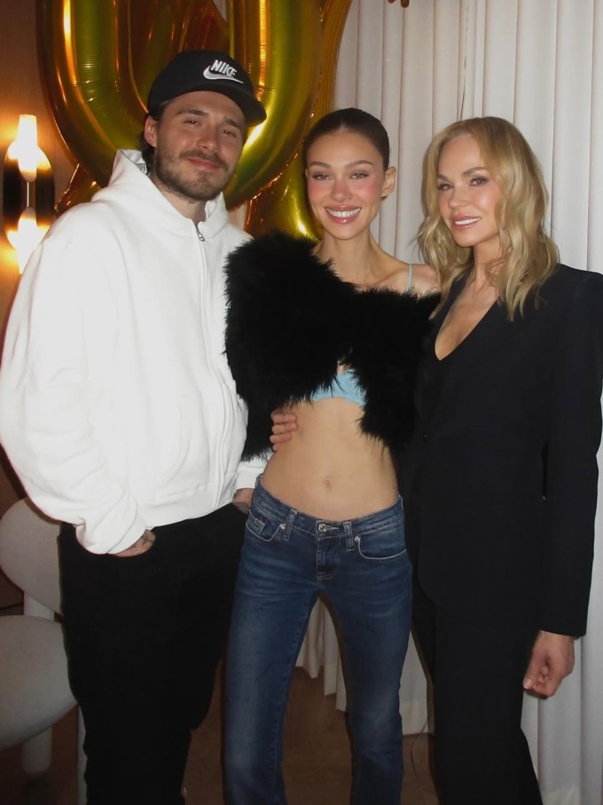 Brooklyn Beckham và Nicola Peltz bên bà Claudia trong tiệc sinh nhật. Ảnh: Instagram