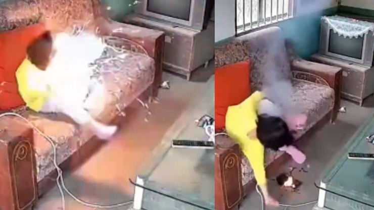 Hình ảnh trích từ video điện thoại phát nổ trong tay bé gái.