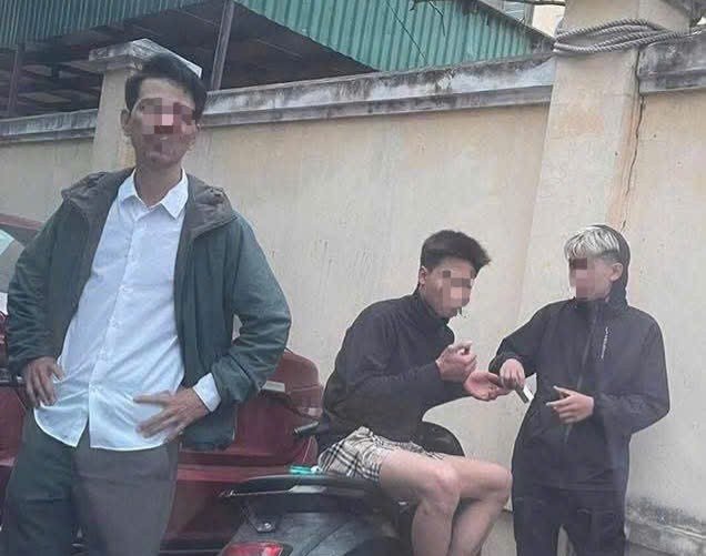 Hình ảnh phụ huynh xô xát với nam thanh niên gần trường học ở Nghệ An gây xôn xao.