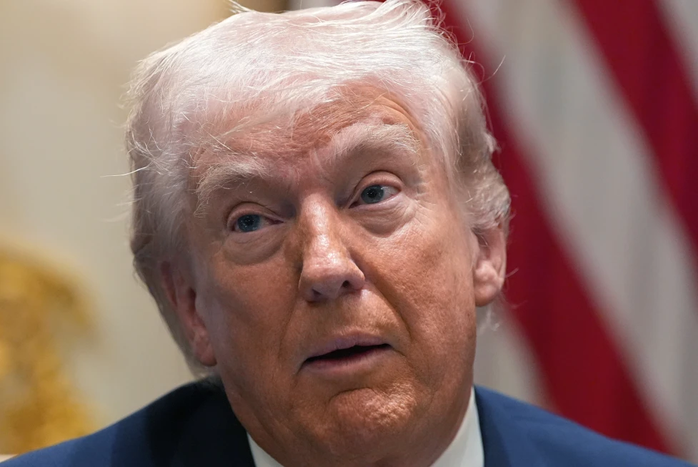 Tổng thống Donald Trump trong cuộc họp Nội các tại Nhà Trắng ngày 26-3. Ảnh: AP