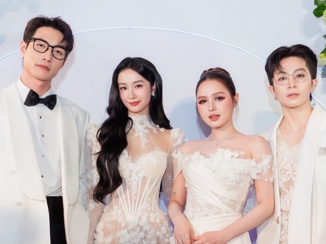 Xoài Non mặc váy cưới sánh đôi Gil Lê trên thảm đỏ