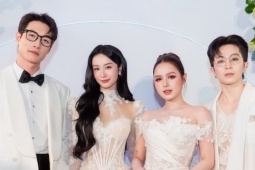 Xoài Non mặc váy cưới sánh đôi Gil Lê trên thảm đỏ