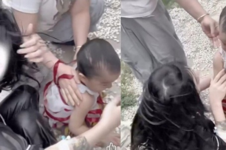 Cô gái nhảy xuống nước cứu em bé dù vẫn đang đeo ống truyền dịch trên tay