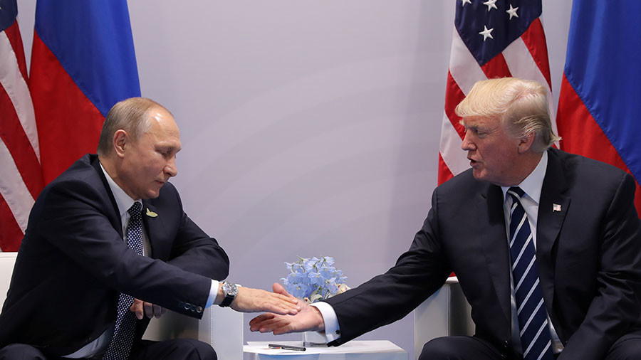 Sau khi trục xuất 60 nhà ngoại giao Nga, Trump bất ngờ muốn gặp Putin - 1