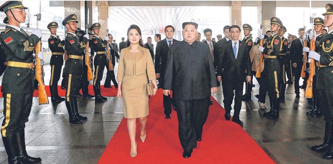 Người phụ nữ đẹp giúp Kim Jong-un tự tin gặp gỡ lãnh đạo nước ngoài - 1