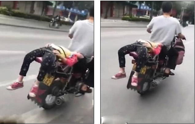 Phẫn nộ bố buộc con gái vào sau xe máy để chở tới trường - 1