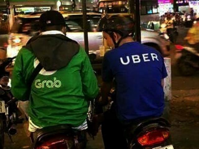 Grab liệu có buộc phải 'ly hôn' với Uber tại Việt Nam?