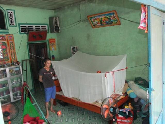 Pháp luật - Vợ đang bế con 2 tháng tuổi nằm trong màn, bị chồng chém suýt chết