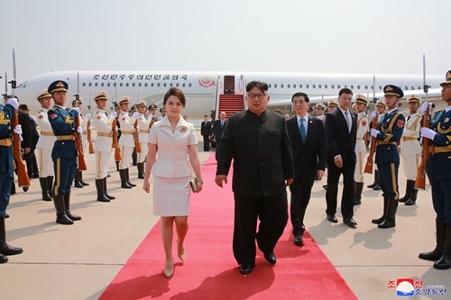Phu nhân ông Kim Jong Un đẹp như một đoá hồng và mặc rất tinh tế - 3