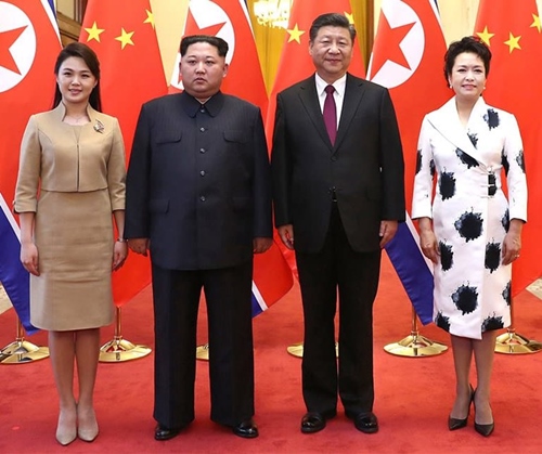 Phu nhân ông Kim Jong Un đẹp như một đoá hồng và mặc rất tinh tế - 6