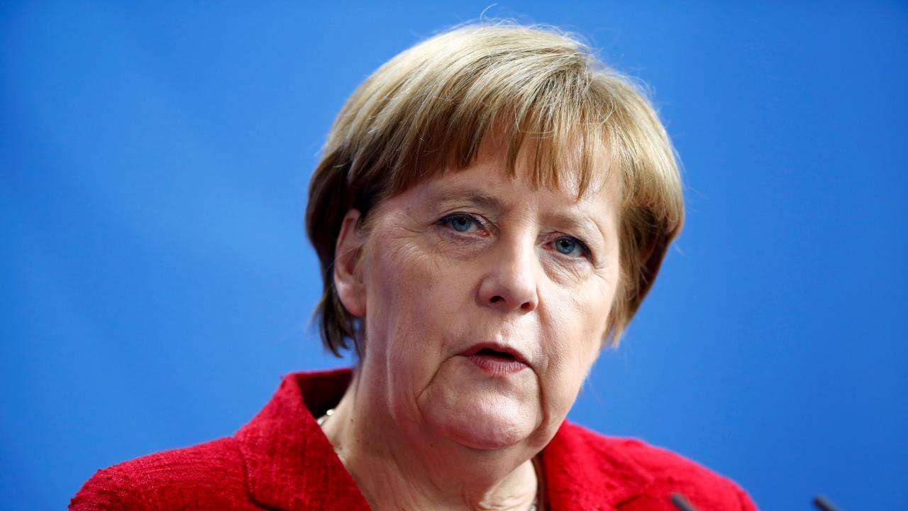 Thủ tướng Đức choáng váng khi đội nhà bị loại khỏi World Cup - 1