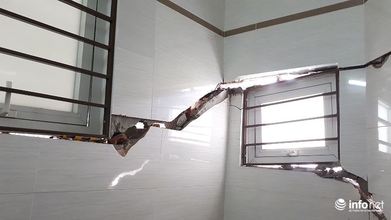 Hà Nội: Hàng loạt nhà mặt đường sụt lún, nứt toác nguy hiểm - 11