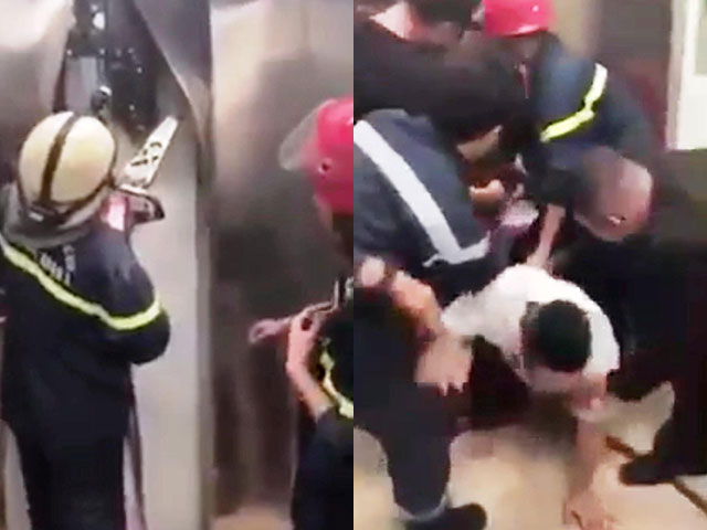 Clip: Cảnh sát phá cửa thang máy trong chớp mắt, giải cứu 21 người mắc kẹt - 1