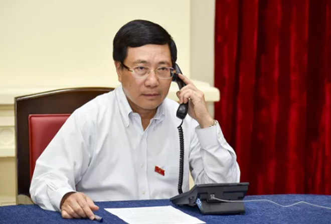 Phó Thủ tướng điện đàm với Ngoại trưởng Singapore về phát biểu của ông Lý Hiển Long - 1