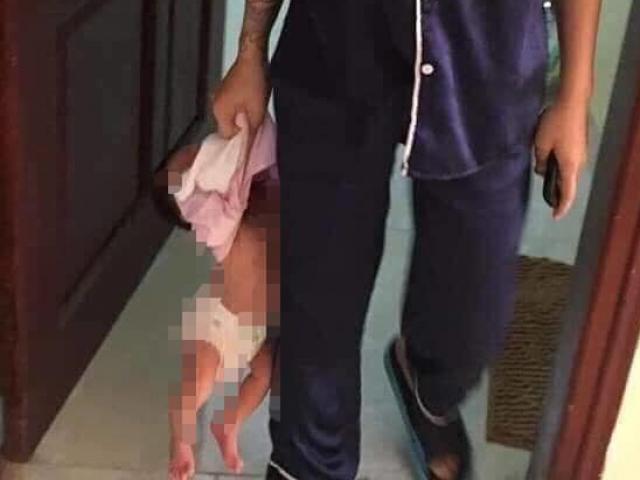 Tin tức trong ngày - Lộ diện người mẹ trẻ xách con "lủng lẳng" trên tay gây sốc