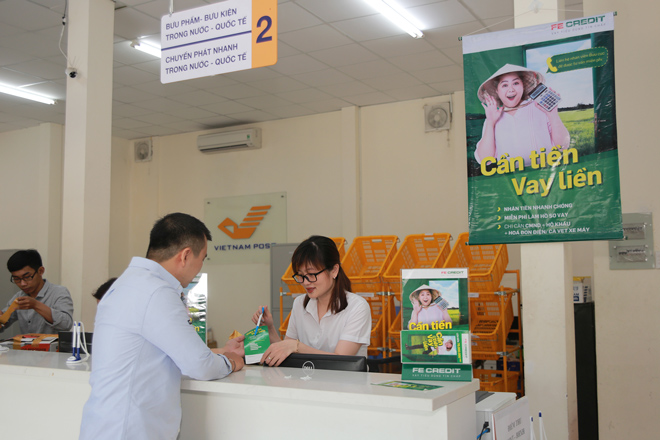 FE CREDIT hợp tác với Bưu Điện VN giới thiệu dịch vụ cho vay tiêu dùng tới nông thôn - 2
