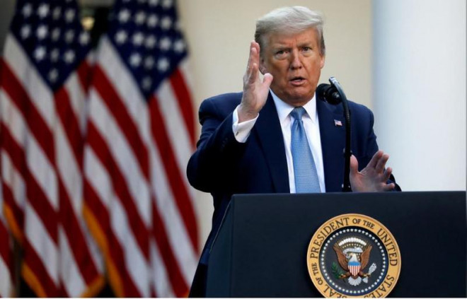 Tổng thống Mỹ Donald Trump họp báo ngày 16-4 tại Nhà Trắng về tình hình dịch COVID-19. Ảnh: REUTERS