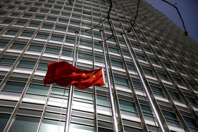 Trung Quốc muốn được khen ngợi về cách xử lý dịch Covid-19. Ảnh: Reuters