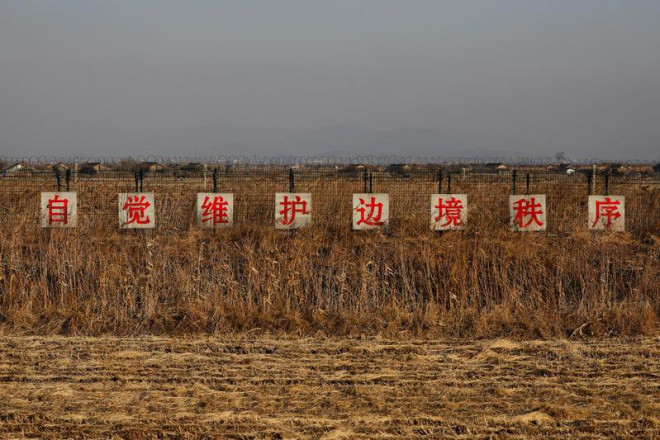 Biên giới TP Đan Đông, tỉnh Liêu Ninh
(Trung Quốc) với Triều Tiên, năm 2017. Ảnh: REUTERS