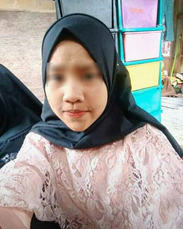 Devi Binti Sulaiman, thiếu nữ 17 tuổi bị cá sấu tấn công khi đang tắm dưới sông. Ảnh: Viral Press