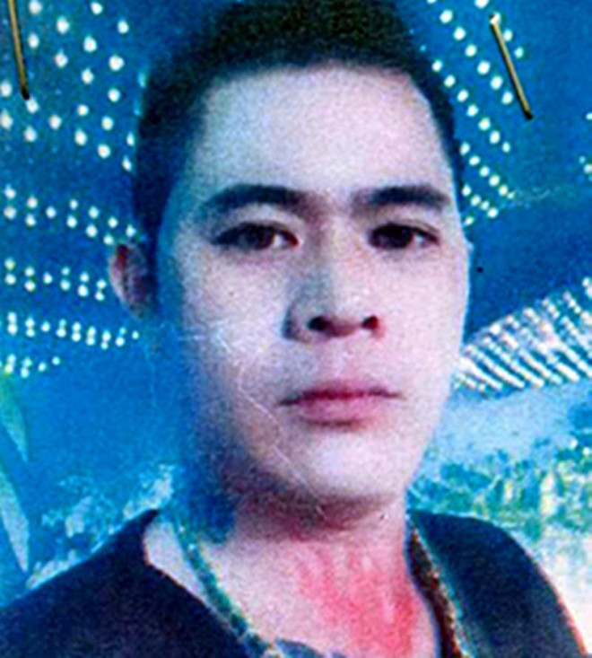 Nguyễn Quang Phương với hình xăm 3 ngọn lửa trên cổ. Ảnh: TL