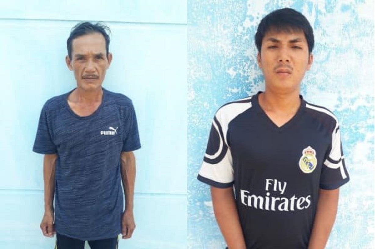 Bố con ông Thừa tại cơ quan công an. Ảnh: Công an Sa Thầy.