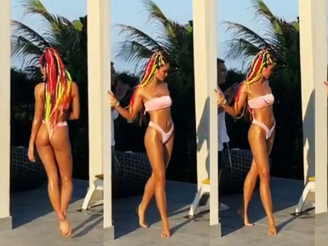 Media - H'Hen Niê catwalk với bikini khoe thân hình nóng bỏng bên hồ bơi