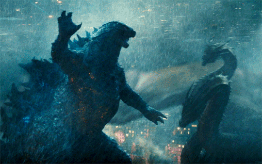 Godzilla vs mechagodzilla epic battle wallpaper | Wallpapers.ai
