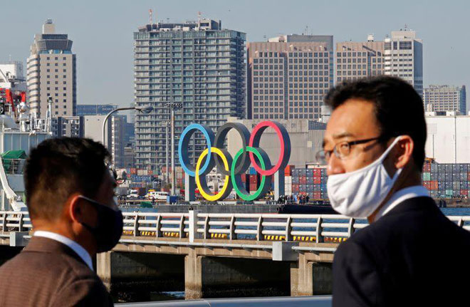 Số ca mắc COVID-19 tăng vọt, Nhật Bản xem xét dừng Olympic Tokyo - 1
