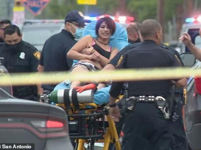 Thế giới - Bị bắn trúng tay, cảnh sát Mỹ vẫn rút súng "lấy mạng" 2 nghi phạm