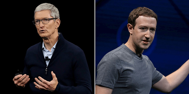CEO Apple - Tim Cook (trái) và ông chủ Facebook - Mark Zuckerberg.