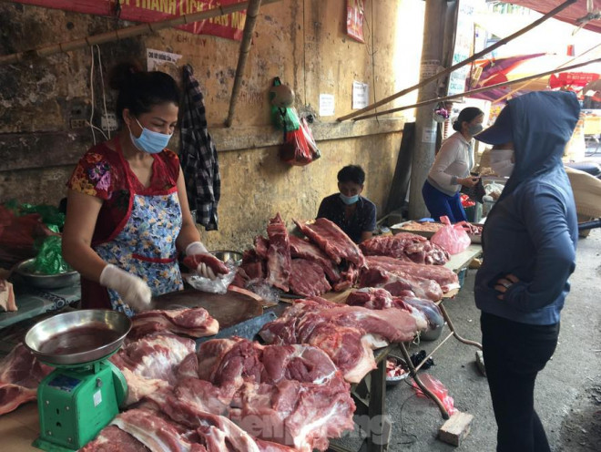 Giá thịt lợn xuống mức thấp nhất trong 1 năm - 1