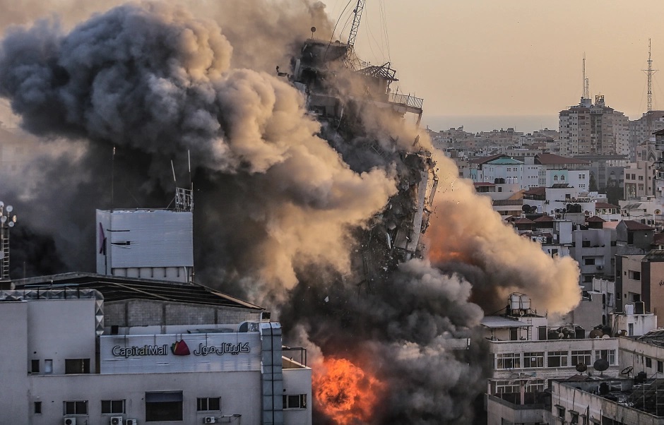 Chùm ảnh: Dải Gaza hỗn loạn sau các đợt nã rocket qua lại giữa Israel và Hamas - 2