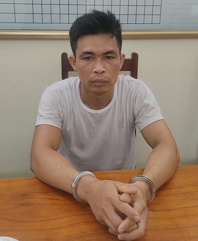 Nguyễn Văn Dũng tại trụ sở công an.