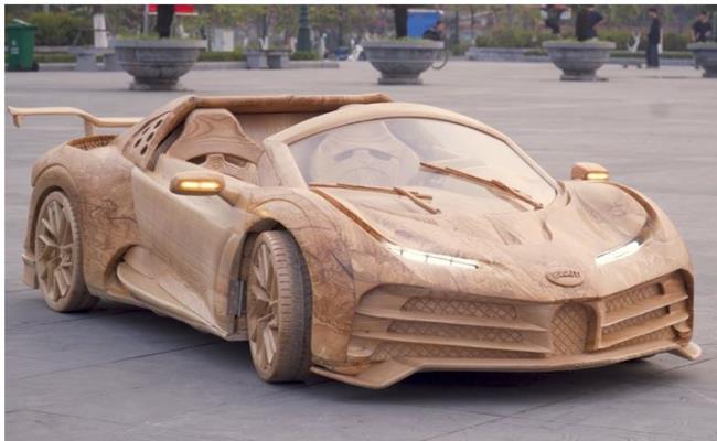 hiếc Bugatti Centodieci bằng gỗ này được anh Trương Quang Đạo (Bắc Ninh) làm riêng cho con trai với các chi tiết được mô phỏng gần nhất với phiên bản xe gốc. 
