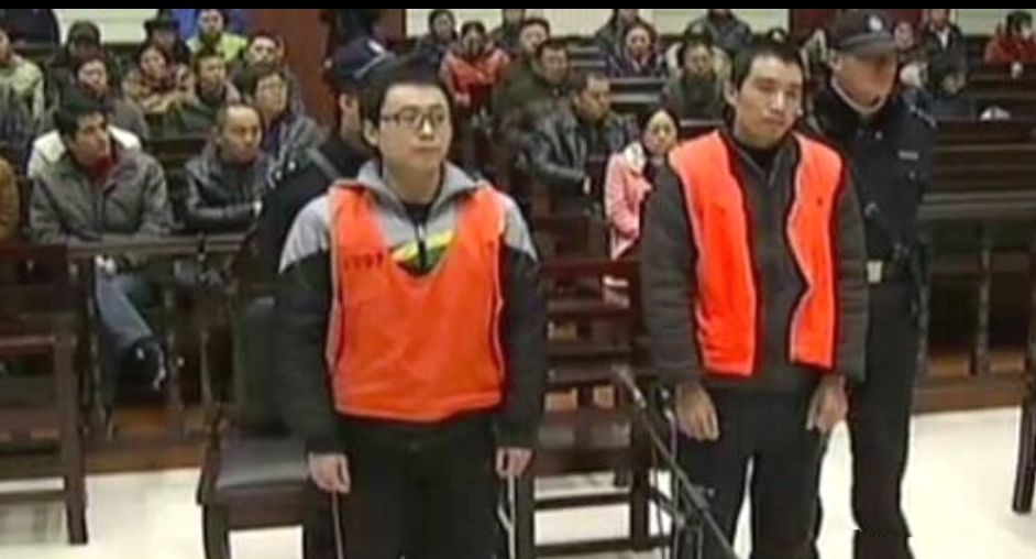 Li Liang và Zhou Jiuwei tại tòa.