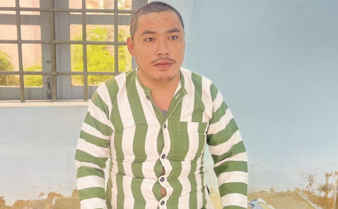 Cao Việt Nhân tại cơ quan điều tra. 