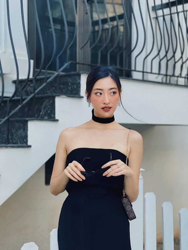 Hoa hậu Đỗ Thị Hà, Lương Thùy Linh đẹp gợi cảm khi 'đụng' váy đen khoe vai trần - 7