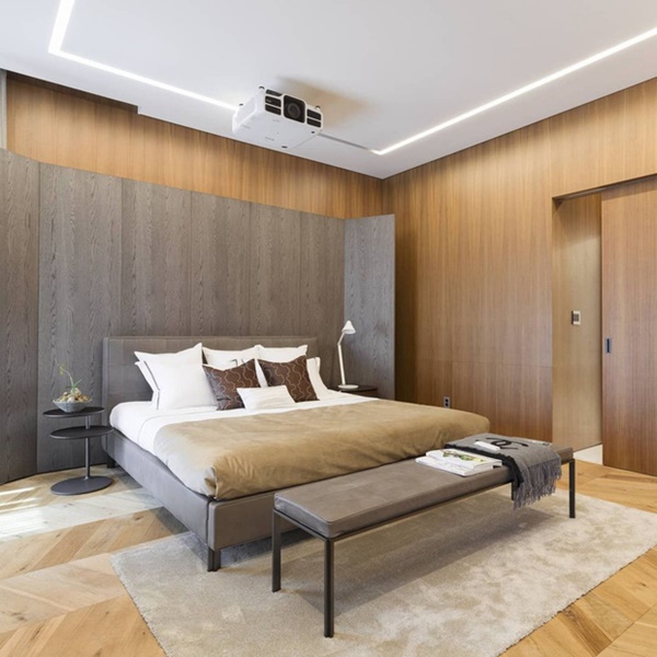 Phòng ngủ được thiết kế theo phong cách tối
giản với tông nâu ấm áp và hiện đại