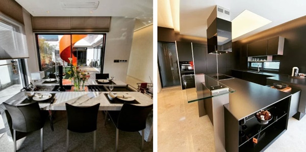 Căn bếp hiện đại của Hyun Bin mang sắc đen
sang trọng và mạnh mẽ như chủ nhân. Những thiết bị nhà bếp hiện đại
chắc chắn sẽ khiến "chị đẹp" Son Ye Jin vô cùng hài lòng. Bàn ăn
lớn trong phòng bếp có thể nhìn ra sân vườn.