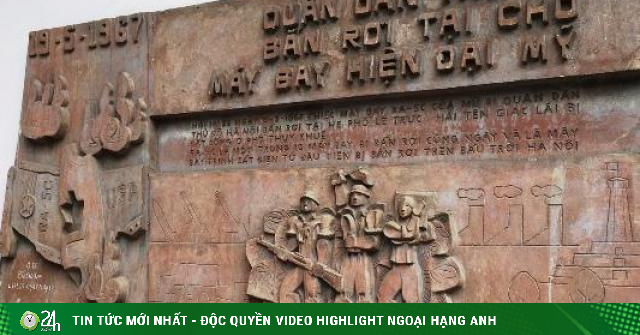How much is the bas-relief at Project 61 Tran Phu worth that Hanoi has to speedily suspend construction?