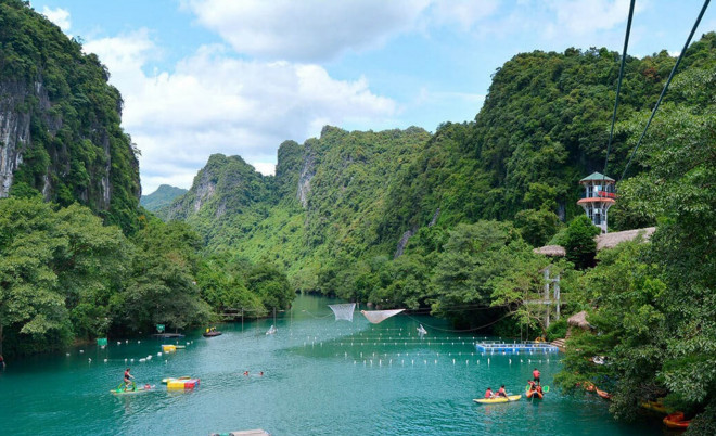 This summer, go to Chay River-Dark Cave to swing rope, take a mud bath - 10