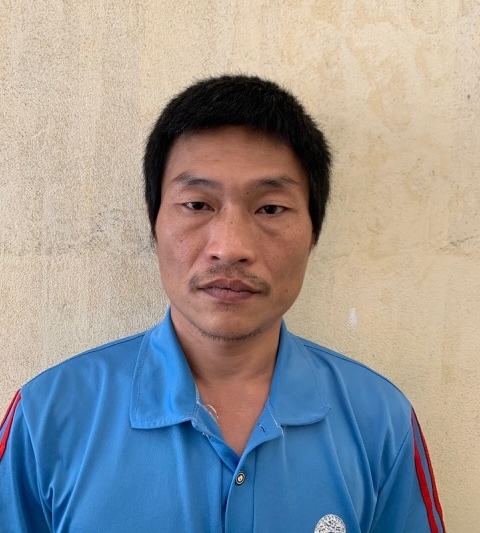 Đặng Ngọc Sơn tại trụ sở công an.