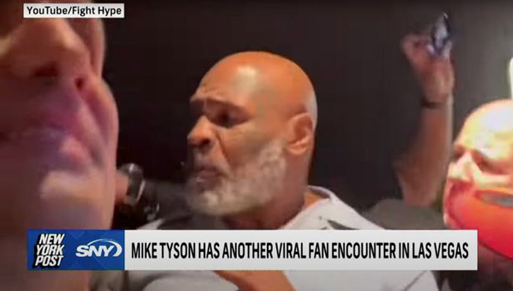 Mike Tyson kiềm chế được cơn giận sau khi bị một fan nữ chọc tay vào mặt mình