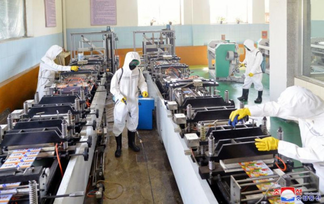 Các công xưởng, nhà máy được khử khuẩn trước khi ổn định lại sản xuất tại Triều Tiên. Ảnh: KCNA