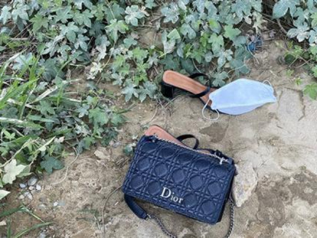 Pháp luật - Nghi nữ kế toán bệnh viện để túi xách trên bờ rồi nhảy sông tự tử