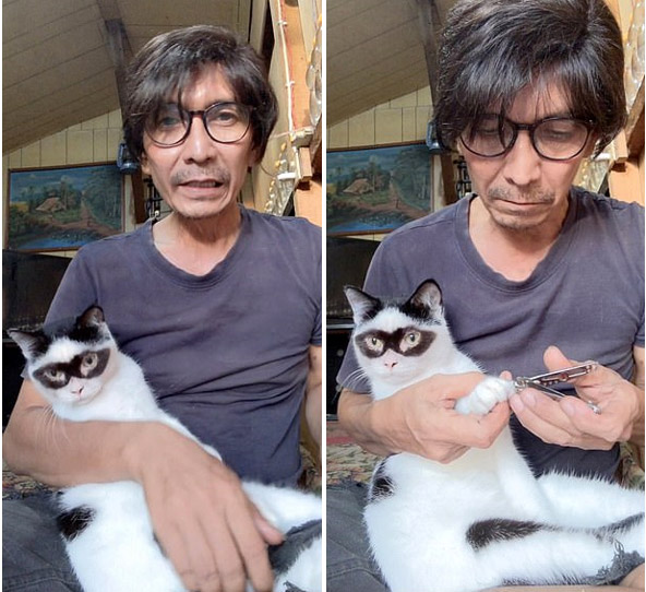 Indraini bên chú con mèo yêu thích của mình