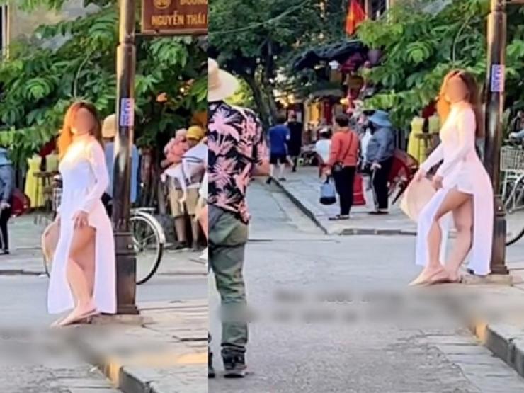 Thời trang - Khách du lịch mặc áo dài phản cảm giữa phố Hội, trong bồn tắm bị la ó, đòi xử phạt