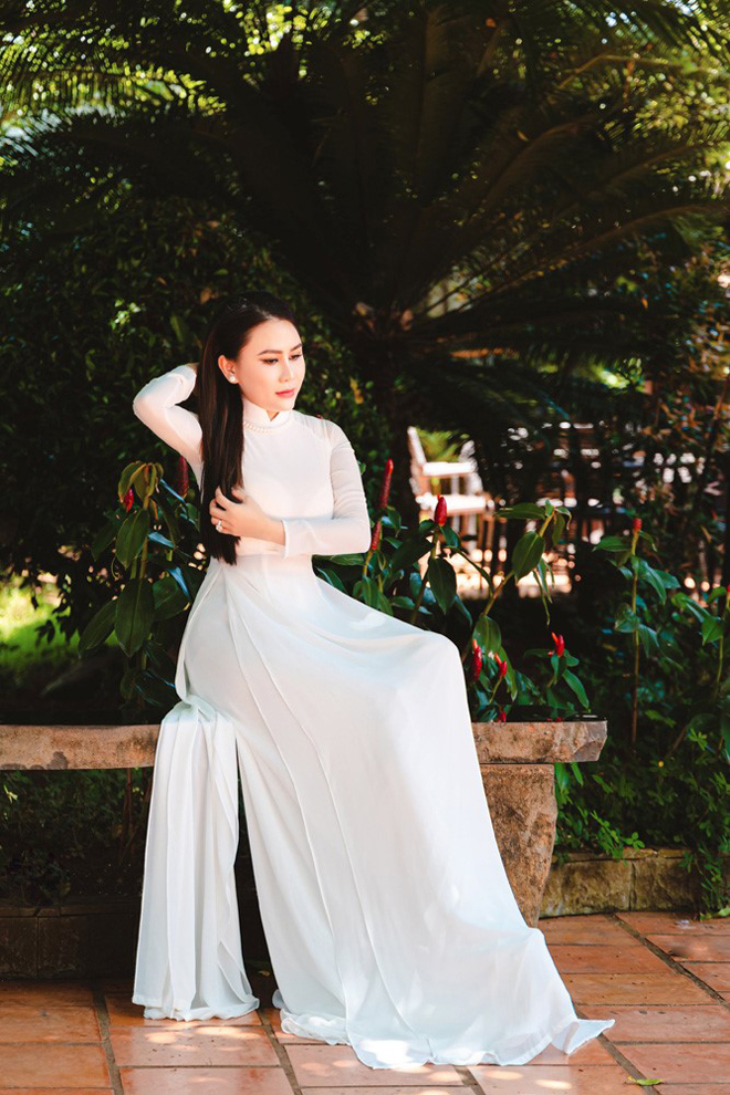 Hoa hậu Lý Kim Ngân: ''Trải qua hàng trăm năm, phụ nữ Việt Nam vẫn đẹp nhất trong tà áo dài'' - 4